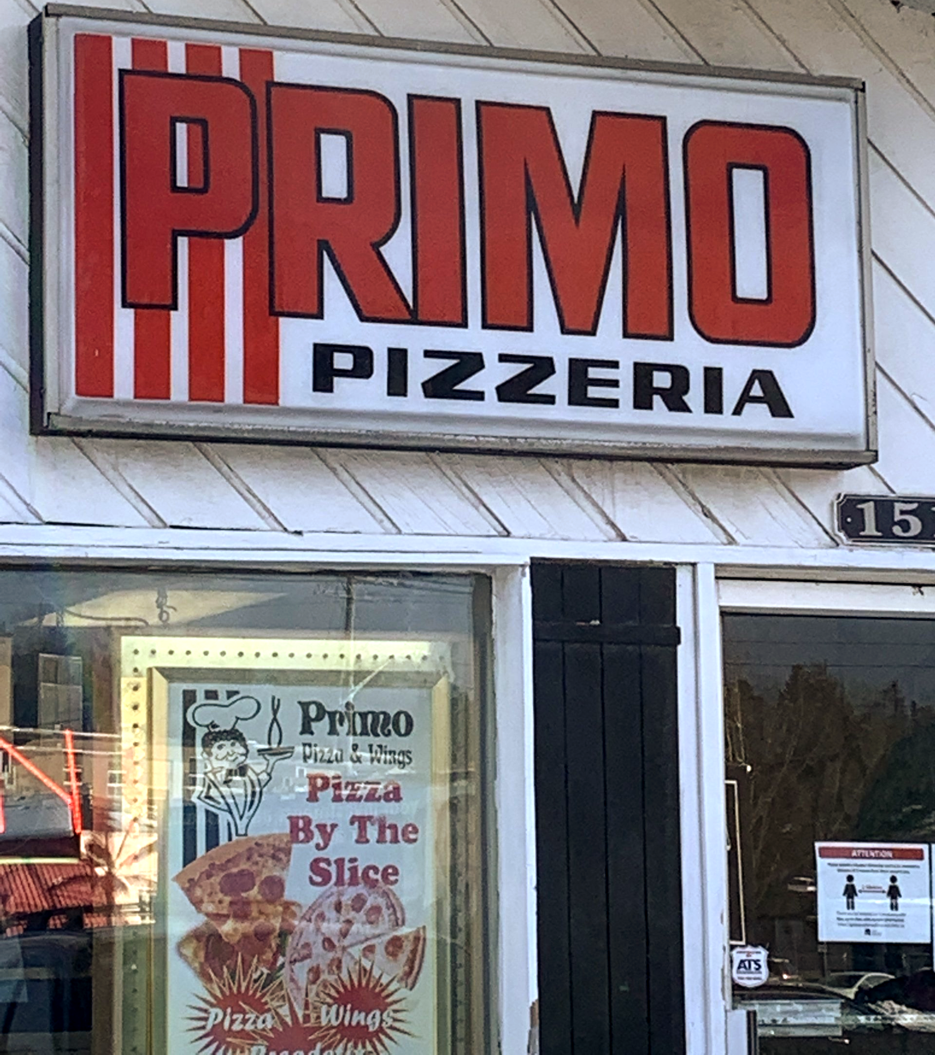 Primo storefront sign